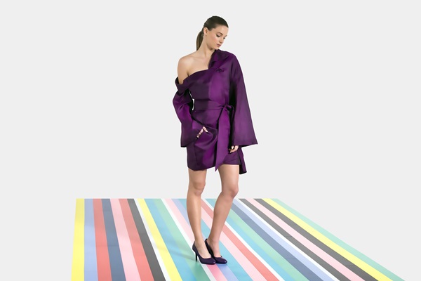 Fashion designer sews philosophy into her silk showstopper
