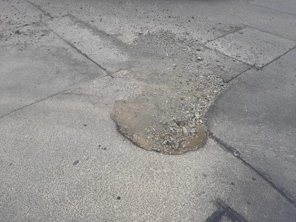 Holey moley – Don’t fall into the asphalt abyss