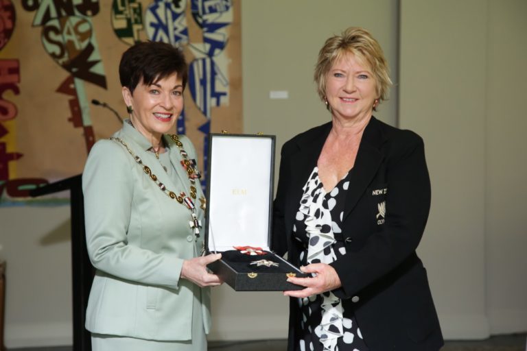 Dame Yvette’s daughter attends investiture ceremony for late mother