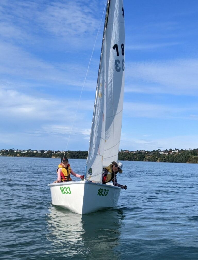 Girls rug up for winter sailing