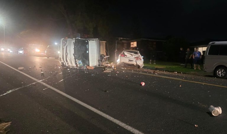 Police investigating after truck crashes into parked vehicle