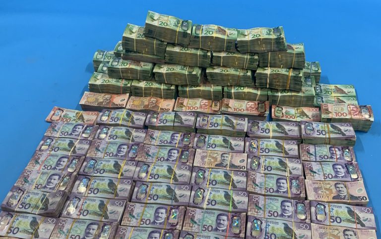 Police seize $1 million in cash, meth, AK-47 from drug dealer