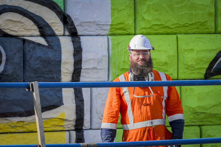 Talented artist flying high for major KiwiRail mural project